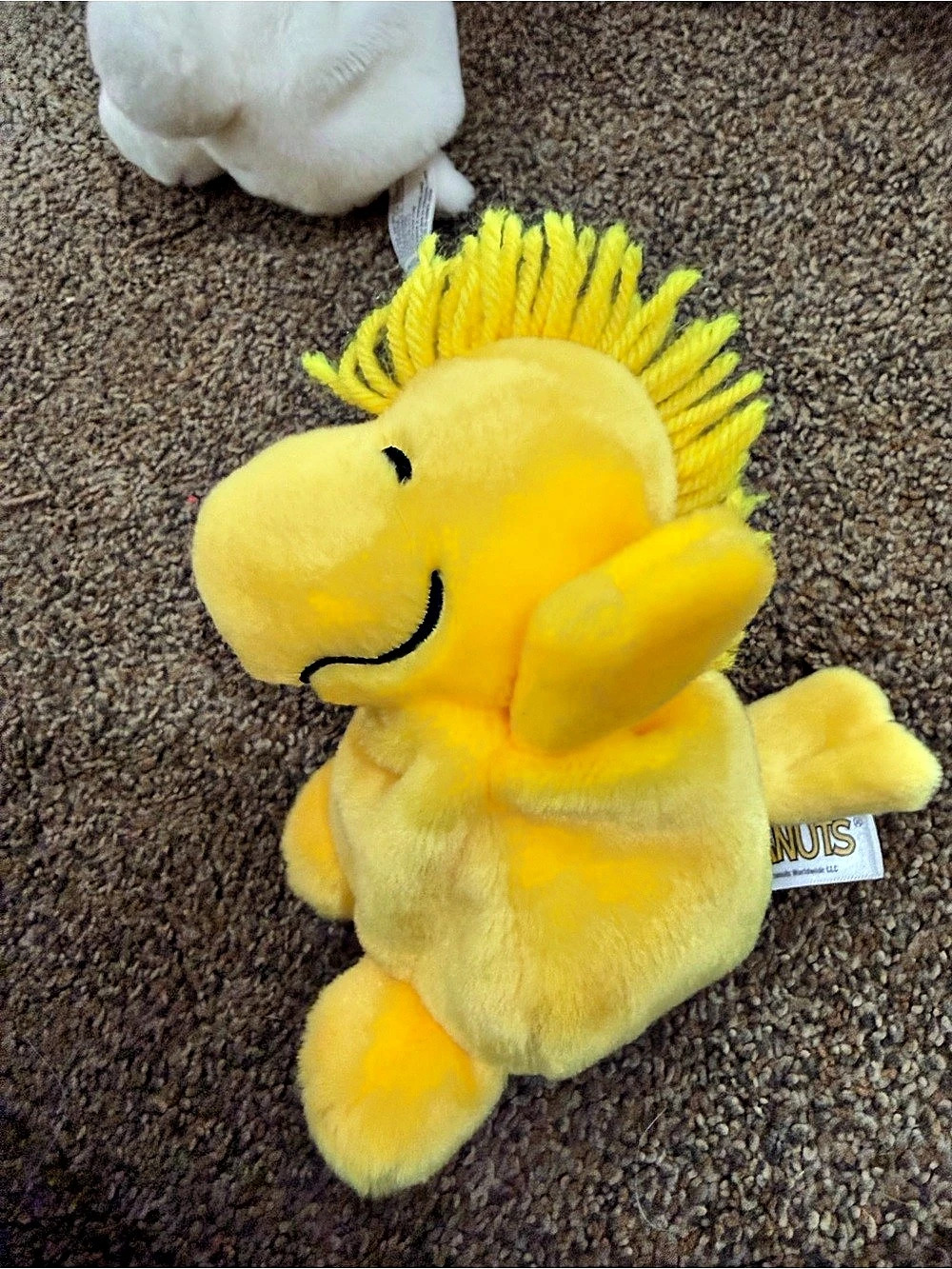 Aurora Peanuts Floppy Woodstock Palm Plush Yellow Toy